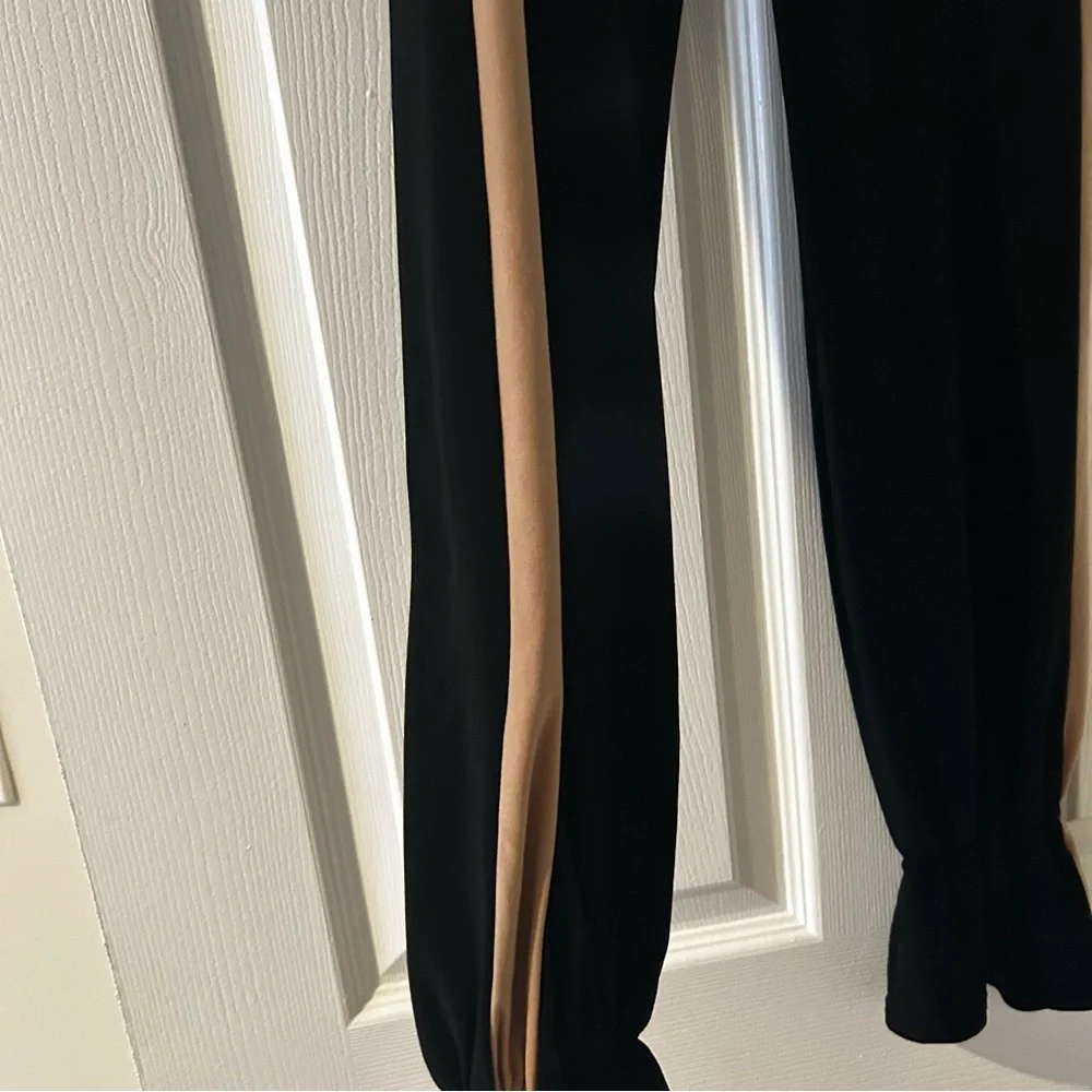 Talisman Ballroom Latin Practice girls black with tan sides pants. Size 142 cm.
